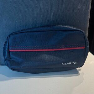 Clarins Black Travel Pouch – Amenity Bag with Red Stripe